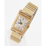 An Art Deco 9ct yellow gold cased Everite automatic wrist watch, the cream tone dial having hourly