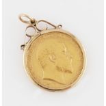 An Edward VII 1902 half sovereign, in a 9ct yellow gold pendant mount, hallmark rubbed.