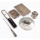 A collection of silverware, to include a Victorian pot lid with cow finial and engraved,