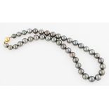 A string of Tahitian pearls, the graduated string of 39 pearls ranging in diameter from 9mm to 12mm,