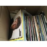 A box of various vinyl albums to include Led Zeplin.