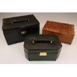 Three jewellery boxes, one Dulwich Designs, one being wooden with inlay, and the other being
