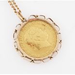 A George III 1817 full sovereign, in pendant mount on yellow metal curb link chain.
