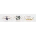 Three rings, two sapphire set and one set with iolite and diamond, all hallmarked Birmingham, ring