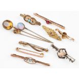 A collection of eight Victorian/early 20th Century bar brooches, some gemstone set to include