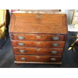 A mahogany Beaureau with four drawers.