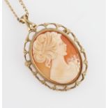 A hallmarked 9ct yellow gold framed cameo pendant/brooch, on an unmarked yellow metal curb link