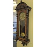 A Victorian mahogany case wall clock by Jones & Jones of Porth.