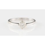 An 18ct white gold diamond solitaire ring, set with a round brilliant cut diamond, measuring approx.