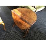 A Sunderland drop leaf table with inlay design.