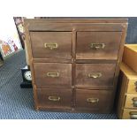 An eight drawer filing cabinet.