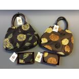 Two Liz Cox Monkton handbags with two boxed Henrietta purses, both with labels.