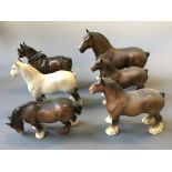 Six Beswick shire horses, four brown, one dappled grey, one with harness.