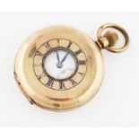 A gold plated half hunter crown wind pocket watch, the white enamel dial having hourly Roman