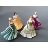 Four Royal Doulton figurines titled 'Katie', 'Sarah', 'Ellie', and 'Elizabeth'.