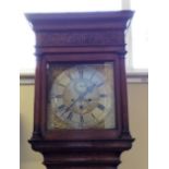 An oak cased Thomas Reynolds grandfather clock with brass and silver fittings, height 215cm.