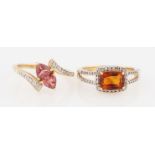 Two 9ct yellow gold gemstone set rings, one set with pink tourmaline and diamond, the other