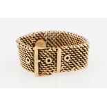 A mesh link buckle design ring, indistinctly stamped, ring size Z+.
