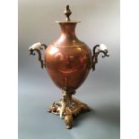 *A copper samovar.