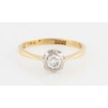 A diamond solitaire ring, illusion set with a round brilliant cut diamond, measuring approx. 0.25ct,
