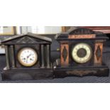 Two slate dome mantle clocks, one with marble design around clock face, the other with slate
