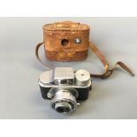 A Tougoda Optical 1950s miniature Hit camera, made in Japan, with case.