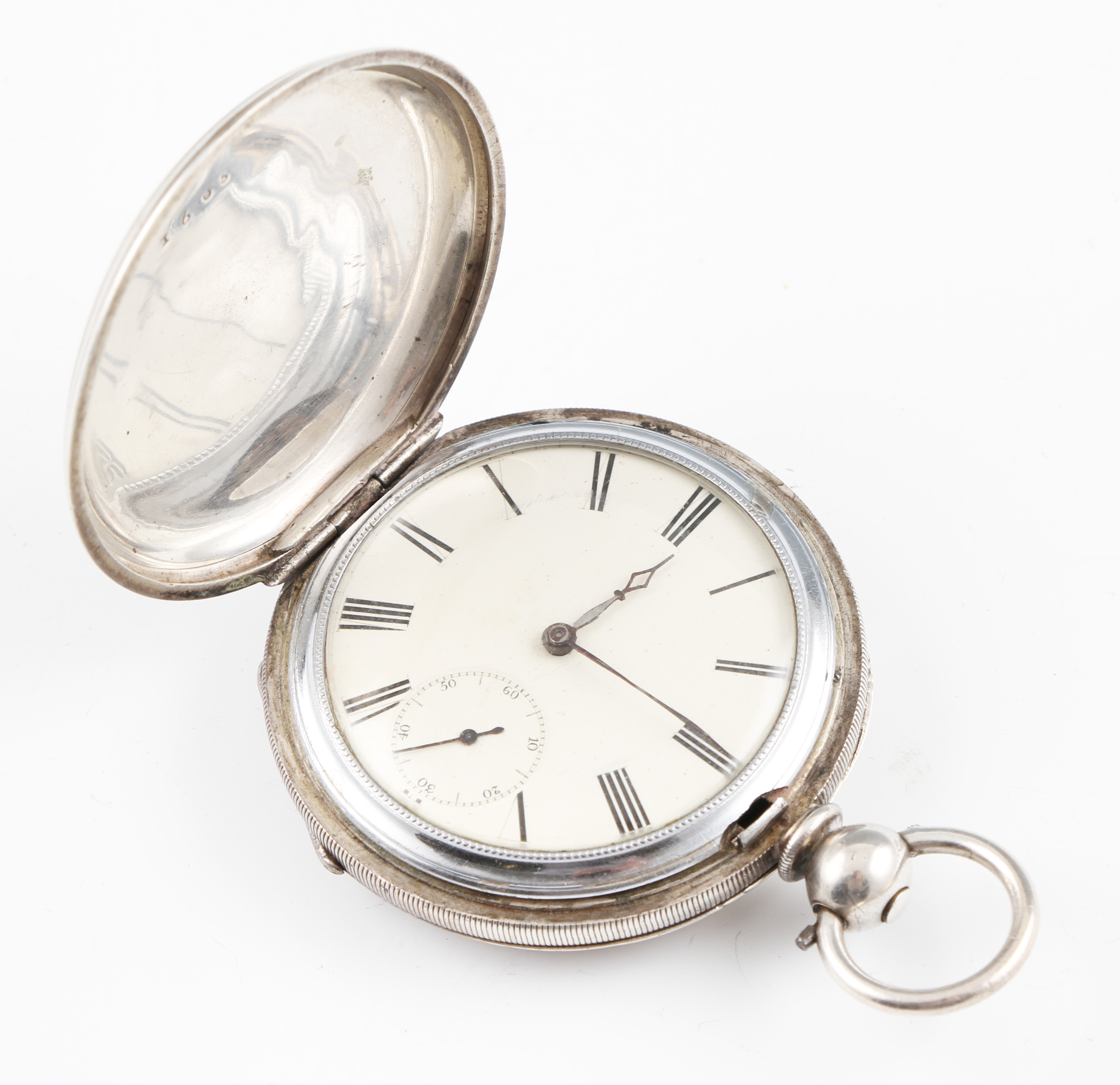 A key wind full hunter pocket watch, the white enamel dial having hourly Roman numeral markers