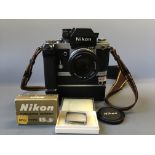 A Nikon F2 SLR camera with attached MD-2 and MB-2 bodies, together with a Nikon Nikkor 50mm 1:1.4
