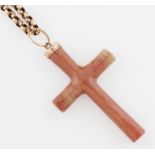 A pink agate cross pendant, on a belcher link chain, stamped 9ct.