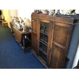 A large oak dresser together with two oak drop leaf tables.