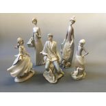 Five Lladro figurines including Medieval style couple, girl with duck and two ladies.