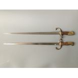 Two French bayonets with wooden handles, engraved St Etiennes June 1876.