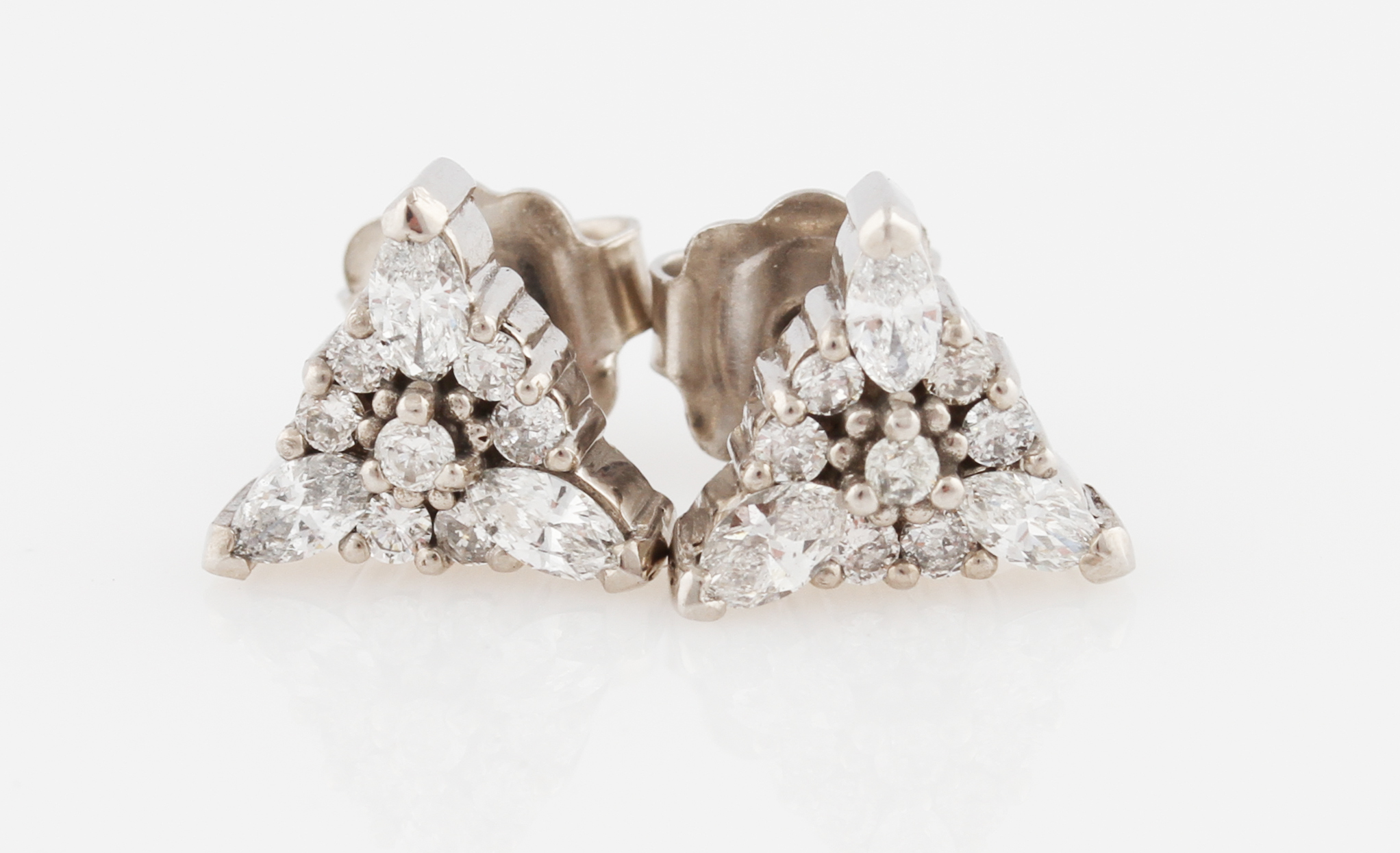 A pair of diamond earrings, the triangular design set with marquise and round brilliant cut