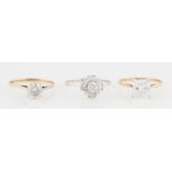 Three 9ct gold hallmarked cubic zirconia rings, ring sizes L-N½, (3).