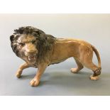 A large Beswick ceramic lion figure.