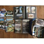 Three albums and two boxes of World postcards including GB m&u.