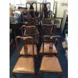 *Eleven Queen Anne style chairs, comprised of two sets of four chairs, and one set of three chairs.