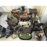 A selection of various ornaments including horses, deer, dog, cows, farmer, etc.