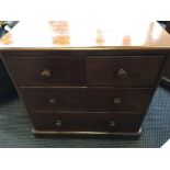 A mahogany chest of drawers.