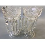 A pair of clear cut glass lustre vases with droppers.