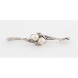 A pearl set bar brooch, stamped 9k E.W.G.