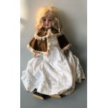 A SPBH Germany 914 10 doll with bisque head.