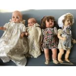 Four dolls, one Cascelloid Paletoy, two in christening gowns and one in summer dress.