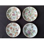 Four hand painted Cantonese plates with bird and floral design.