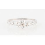 An 18ct white gold diamond ring, the principal round brilliant cut diamond measuring approx. 0.60ct,