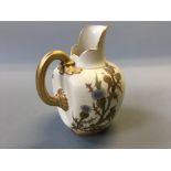 A Royal Worcester model 1094 floral decorated on cream ground jug.