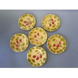 Ten Majolica plates strawberry pattern French name to base.