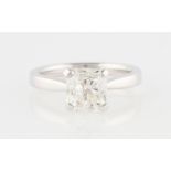 An 18ct white gold diamond solitaire ring, set with an asscher cut diamond, measuring approx. 2.
