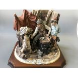 A large Capo di Monte figure 'The Chestnut Roaster' signed Bellinaso.