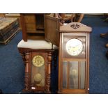 Three various wall clocks, and an oak smokers cabinet.